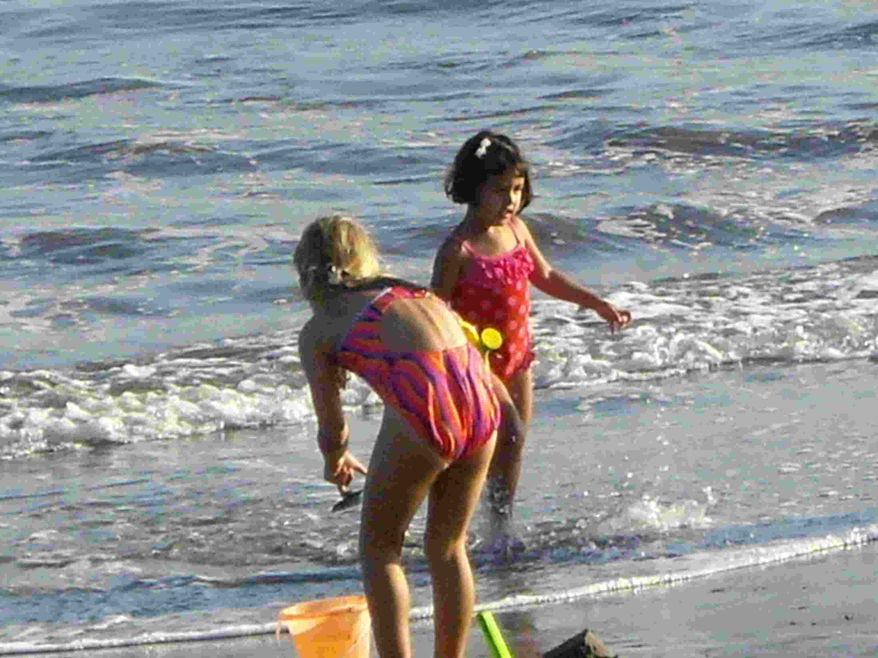Hope playing with new friend, Santa Barbara, Aug 2012