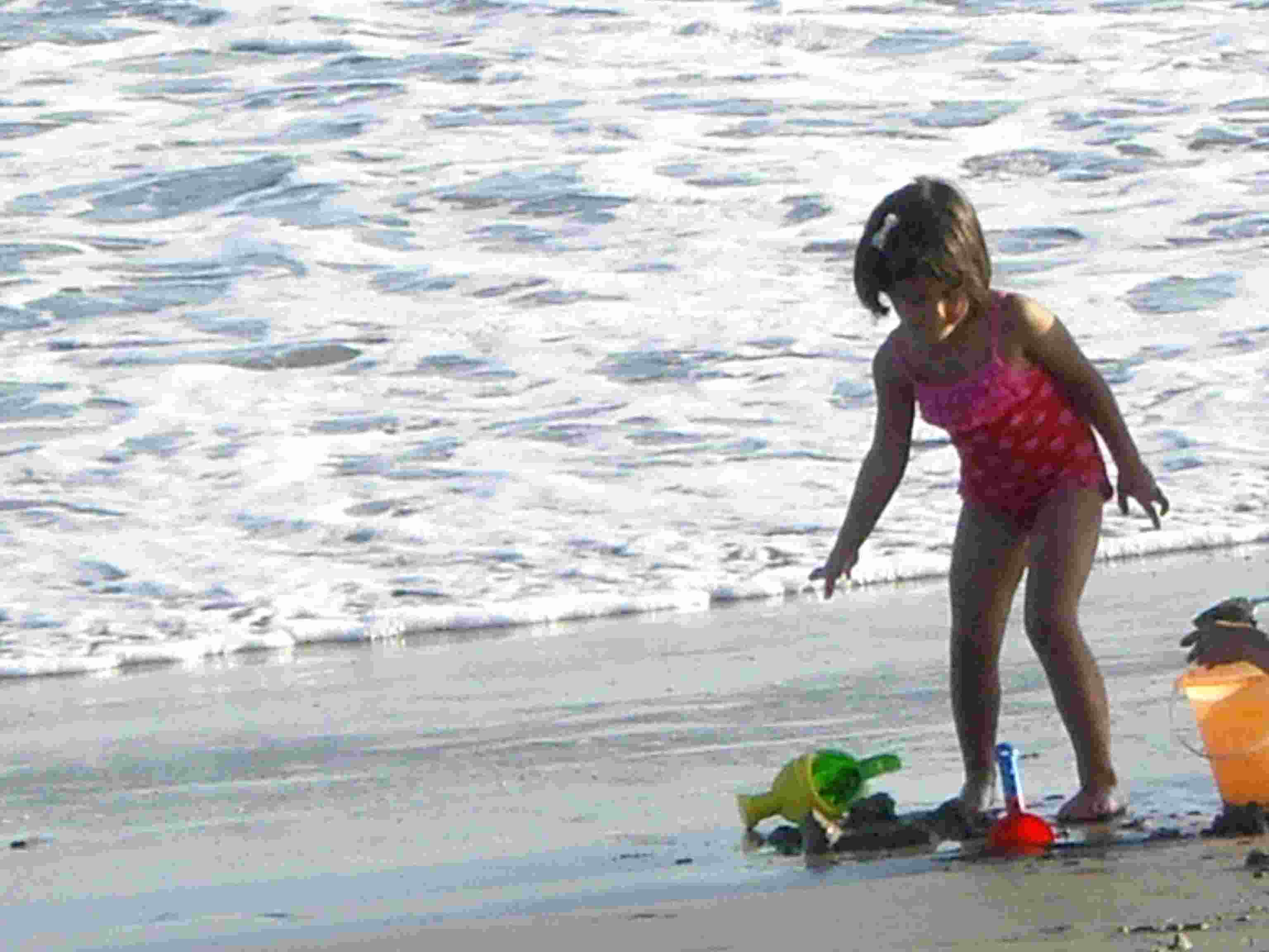 Hope’s first time in the surf, Santa Barbara, Aug 2012